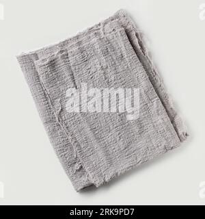 folded grey cotton napkin on white background, top view Stock Photo