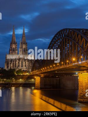 Cologne Germany, bridge and Cologne Cathedral aerial view at night Stock Photo