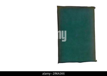 Old books: A dark green Victorian calf book binding. A soft cover binding set down on thin boards. White background, copy space. Stock Photo