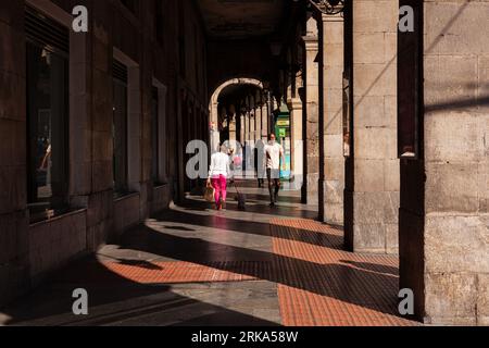Bilbao, Spain - August 02, 2022: Arcade in the Erribera Kalea, the old town of Bilbao Stock Photo