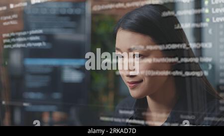 Computer scientist using AR technology to visualize script, writing code on computer screen while in office using JavaScript programming language. Specialist working on fixing company servers errors Stock Photo
