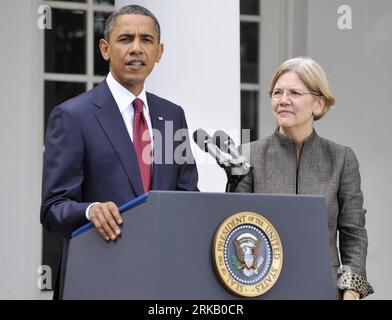 100917 -- WASHINGTON, Sept. 17, 2010 Xinhua -- U.S. President Barack Obama speaks to the media as Elizabeth Warren listens in the Rose Garden of the White House in Washington D.C., capital of the United States, Sept. 17, 2010. Obama on Friday announced the appointment of Elizabeth Warren to serve as assistant to the President and special advisor to the Secretary of the Treasury on the Consumer Financial Protection Bureau. Xinhua/Zhang Jun US-WASHINGTON-OBAMA-ECONOMY-WARREN PUBLICATIONxNOTxINxCHN Stock Photo