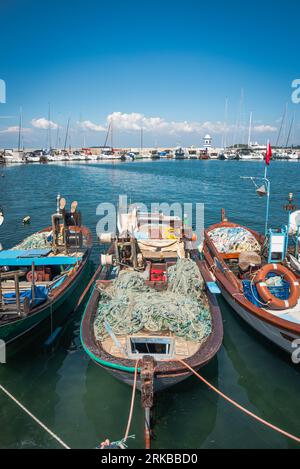 Izmir, Turkey - April 22 2023: Moored fishing boats at the harbour. Iskele, Urla. Stock Photo