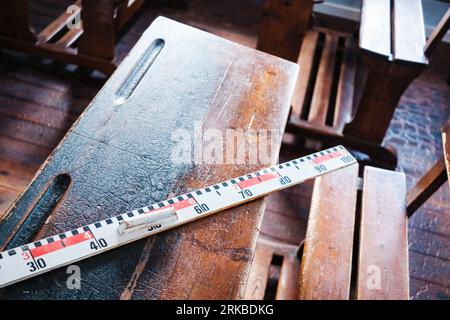 A metric ruler on a desk from another era, made of wood, vintage Stock ...