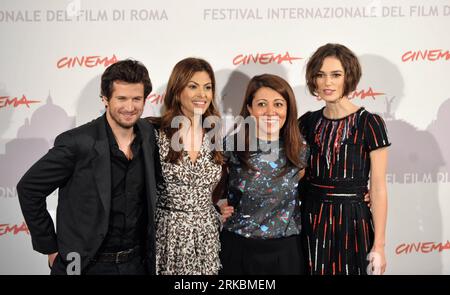 Keira Knightley and director Massy Tadjedin at the photo call for Last  Night during the 5th International Rome Film Festival before attending the  red carpet premiere which was interrupted by a protest