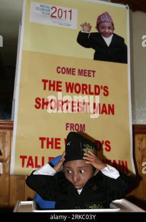 101112 -- LONDON, Nov. 12, 2010 Xinhua -- Nepalese world s shortest man Khagendra Thapamagar attends a promotion of Nepalese tourism in London, capital of Britain, Nov. 11, 2010. Measuring 67.08 cm tall and 5.5 kilograms in weight, 18-year old Khagendra Thapamagar has been confirmed by the Guiness World Records to be the world s shortest adult man this year. Xinhua/Bimal Gautam BRITAIN-LONDON-WORLD S SHORTEST MAN PUBLICATIONxNOTxINxCHN Stock Photo