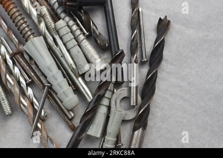 Close-up of drill bits with screws ready for work, representing efficiency in construction. Set of close-up drills, perfect for representing precise w Stock Photo