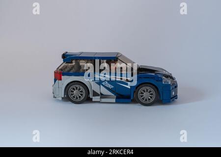 Doha, Qatar - August 24, 2023: Blue plastic building blocks car on a white background. Stock Photo