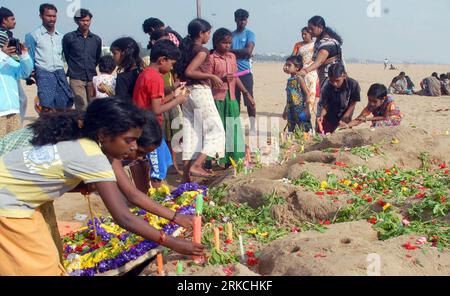 Bildnummer: 54769589  Datum: 26.12.2010  Copyright: imago/Xinhua (101226) -- NEW DELHI, Dec. 26, 2010 (Xinhua) -- pay tributes to the victims of the December 2004 tsunami at Marina Beach in Chennai, capital of Tamil Nadu State, India, Dec. 26, 2010. The ritual was held here on Sunday to commemorate the victims of the tsunami catastrophe on Dec. 26, 2004. (Xinhua) (lyi) INDIA-CHENNAI-TSUNAMI-COMMEMORATION PUBLICATIONxNOTxINxCHN Gesellschaft Naturkatastrophe Trauer Gedenken kbdig xmk 2010 quer premiumd  Jahrestag    Bildnummer 54769589 Date 26 12 2010 Copyright Imago XINHUA  New Delhi DEC 26 201 Stock Photo