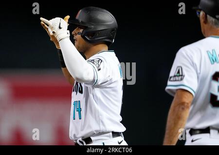 Arizona Diamondbacks' Gabriel Moreno hits against the Milwaukee Brewers  during the fourth inning of a baseball game, Monday, April 10, 2023, in  Phoenix. (AP Photo/Matt York Stock Photo - Alamy