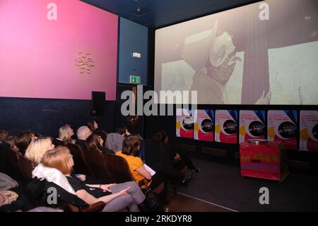 Bildnummer: 55020549  Datum: 13.03.2011  Copyright: imago/Xinhua (110313) -- VIENNA, March 13, 2011 (Xinhua) -- Audience watch The Tongueling by Finnish animator Elli Vuorinen who won Tricky Women Award of the City of Vienna at the TRICKY WOMEN 2011 International Animation Festival in Vienna, Austria, March 13, 2011. 41 animations from Austria as well as some other countries took part in the competition and 10 Chinese-made animations by students were shown at the festival held from March 10 to 14, 2011. (Xinhua/Xu Liang) AUSTRIA-VIENNA-INTERNATIONAL COSPLAY-AWARD PUBLICATIONxNOTxINxCHN Enterta Stock Photo