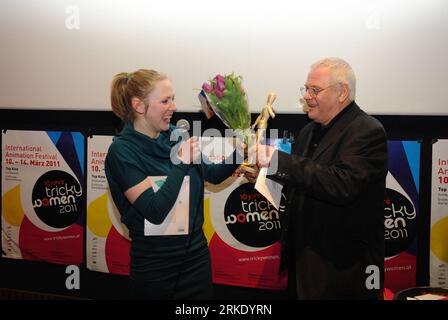 Bildnummer: 55020548  Datum: 13.03.2011  Copyright: imago/Xinhua (110313) -- VIENNA, March 13, 2011 (Xinhua) -- Austrian animator Adele Raczkoevi (L) who won Award for an Austrian Animation with her work Looking for Love at the TRICKY WOMEN 2011 International Animation Festival in Vienna, Austria, March 13, 2011. 41 animations from Austria as well as some other countries took part in the competition and 10 Chinese-made animations by students were shown at the festival held from March 10 to 14, 2011. (Xinhua/Xu Liang) AUSTRIA-VIENNA-INTERNATIONAL ANIMATION-AWARD PUBLICATIONxNOTxINxCHN Entertain Stock Photo