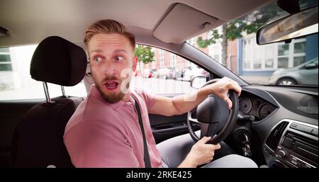 Car Driving Reverse Accident Fear. Driving Man Inside Stock Photo
