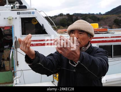 Bildnummer: 55207752  Datum: 03.04.2011  Copyright: imago/Xinhua KESENNUMA, April 3, 2011 (Xinhua) -- Susumu Sugawara recalls the scene during the tsunami in Oshima, an offshore island of Kesennuma, Miyagi Prefecture, Japan, April 3, 2011. Sixty-nine-year-old Susumu Sugawara, captain of the ferry Himawari , has been transporting injured and relief goods between Oshima and outside since the devastated earthquake and tsunami with his ferry, which he saved by driving it through 10-metre-high waves during the tsunami. The ferry becomes the only one to link the transportation between Oshima and out Stock Photo