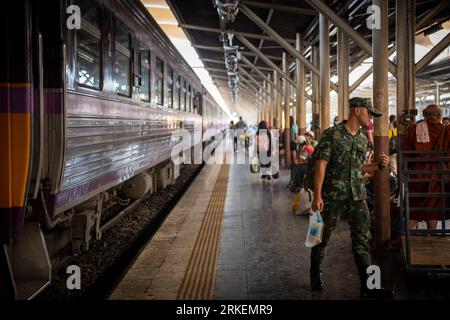 Bangkok, Thailand - March 6th 2020: A scene at Bangkok Railway Station. The photograph captures the transient moments of daily life at the station. Stock Photo