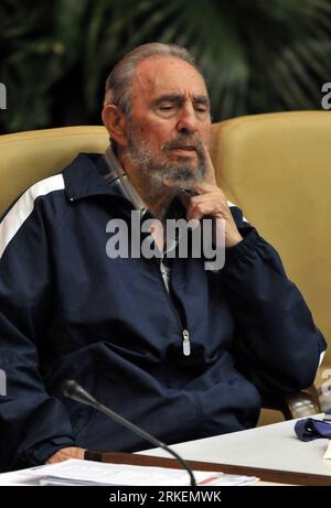 Cuban leader Fidel Castro attends a military ceremony upon his arrival ...