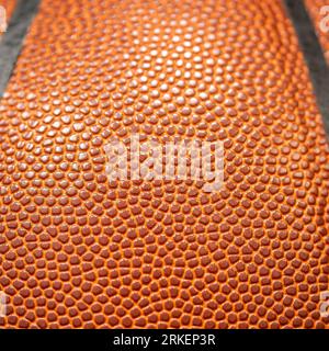 Closeup detail of orange basketball ball texture background with empty space for text Stock Photo