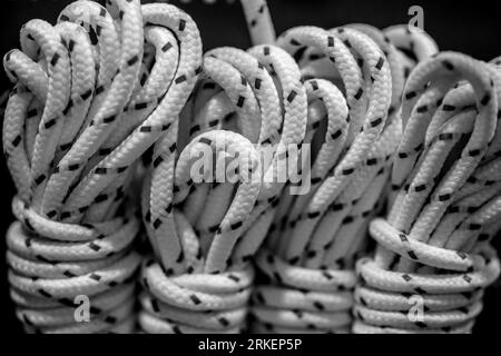 Climbing rope on dark background. Nylon rope Stock Photo