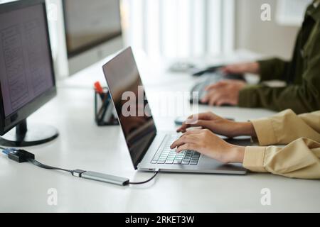 Hands of software developers working in office on startup project Stock Photo