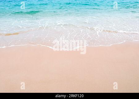 Soft beautiful ocean wave on sandy beach. Background. Copy space. Stock Photo