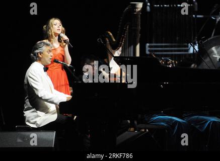 Bildnummer: 55356758  Datum: 17.05.2011  Copyright: imago/Xinhua (110518) -- TAIPEI, May 18, 2011 (Xinhua) -- Andrea Bocelli (front), a famous blind Italian tenor, sings with Hayley Wesstenra in his concert in Taipei Arena in Taipei, southeast China s Taiwan, May 17, 2011. Andrea Bocelli will also hold concerts in Beijing National Stadium on May 20 and 21, 2011. (Xinhua/Wu Ching-teng) (lfj) #CHINA-TAIPEI-ANDREA BOCELLI-CONCERT (CN) PUBLICATIONxNOTxINxCHN Kultur People Musik Aktion premiumd kbdig xsp xo0x 2011 quer     Bildnummer 55356758 Date 17 05 2011 Copyright Imago XINHUA  Taipei May 18 20 Stock Photo