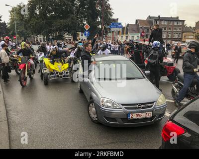 Herstal, Belgium. 25th Aug, 2023. People with bikes and in cars seen outside the church, after the funeral ceremony for the young man shot dead by the police on 18 August in Oupeye after running over a policeman with his quad bike, Friday 25 August 2023 in Herstal. BELGA PHOTO Credit: Belga News Agency/Alamy Live News Stock Photo