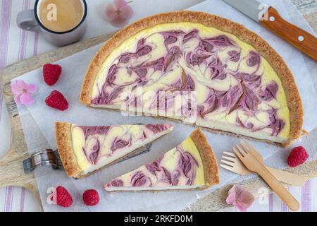 raspberry cheese tart on the wooden board Stock Photo