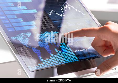 Financial Data Analyst Female Using KPI Dashboard On Laptop Stock Photo