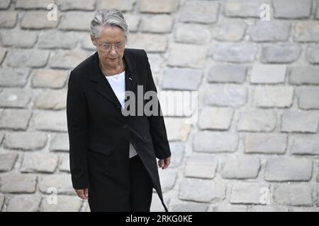 Paris, France. 25th Aug, 2023. Prime Minister Elisabeth Borne during Jean-Louis Georgelin's national tribute held at the Hotel des Invalides in Paris, France on August 25, 2023. French former chief of staff of the armies and CEO of the Public Establishment in charge of the conservation and restoration of Notre-Dame de Paris cathedral, Jean-Louis Georgelin is dead on Friday, August 18th, at 74. Photo by Eliot Blondet/ABACAPRESS.COM Credit: Abaca Press/Alamy Live News Stock Photo
