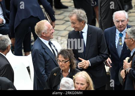 French businessman, chairman and CEO of Kering, Francois-Henri Pinault,  World's top luxury group LVMH head Bernard Arnault and CEO of LVMH Holding  Company, Antoine Arnault during Jean-Louis Georgelin's national tribute  held at