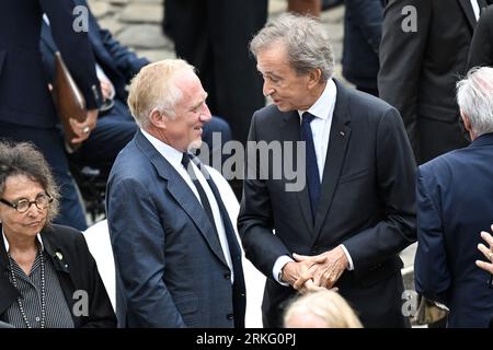 French businessman, chairman and CEO of Kering, Francois-Henri Pinault,  World's top luxury group LVMH head Bernard Arnault and CEO of LVMH Holding  Company, Antoine Arnault during Jean-Louis Georgelin's national tribute  held at