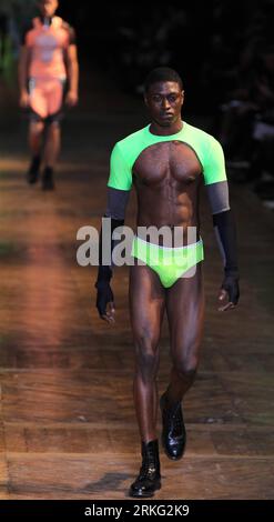 (110622) -- PARIS, June 22, 2011 (Xinhua) -- A model presents a creation by Japanese-Italian designer Nicola Formichetti and French designer Romain Kremer for Thierry Mugler during their spring-summer 2012 men s fashion collection show in Paris, France, June 22, 2011. (Xinhua/Gao Jing) (zw) FRANCE-PARIS-FASHION-MEN-MUGLER PUBLICATIONxNOTxINxCHN Stock Photo