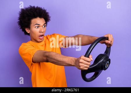 Creative photo collage of funny guy shocked unhappy holding not control steering wheel car crash isolated on violet color background Stock Photo