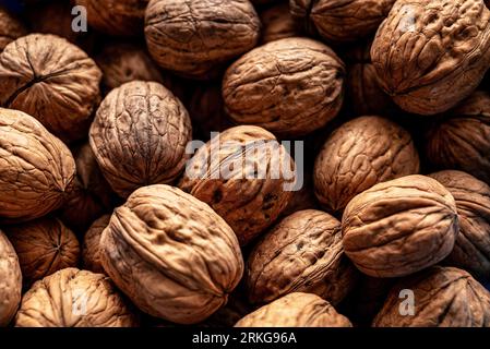 Fresh organic whole walnuts, filling the picture. Background of organic walnuts texture Stock Photo