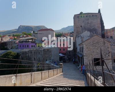 Stari Most (Old Bridge) Mostar Old Town Unesco Site with colourful restaurants on a summers morning, Bosnia and Herzegovina, August 23, 2023. Stock Photo