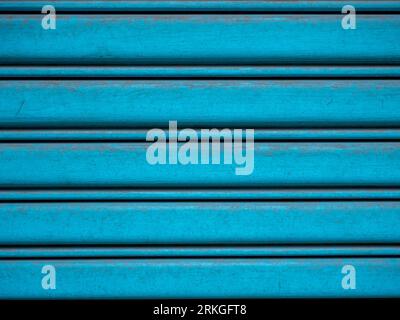 Close up shot of Old Steel shutter door, metal door background and textured , blue color Stock Photo
