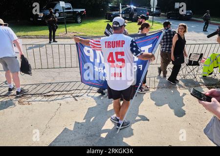 Atlanta, Ga. 24th Aug, 2023. 2023 - Supporters of former US President Donald J. Trump gather outside Fulton County Jail in Atlanta, Georgia where he is expected to surrender at the jail later this afternoon and will have his mug shot taken for the first time on August 24, 2023. Credit: Carlos Escalona/Cnp/Media Punch/Alamy Live News Stock Photo