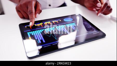 Predictive Business Analytics. African American Analyst Using Computer Stock Photo
