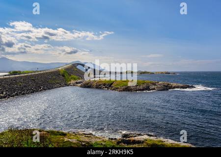 The Storseisundet Bridge (Storseisundbrua) on Atlantic Ocean Road connecting mainland Romsdal peninsula to island of Averøya in Møre og Romsdal Norway Stock Photo