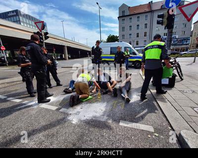 Munich, Bavaria, Germany. 25th Aug, 2023. For a second day in a row the Letzte Generation climate activists held a street blockade at the Donnersberger BrÃÂ¼cke in Munich, Germany. Promising the make Munich the Ã¢â‚¬Å“HochburgÃ¢â‚¬Â for their protests, the Letzte Generation (Last Generation) climate activist group planned to carry out actions throughout Munich as part of the Ã¢â‚¬Å“tourÃ¢â‚¬Â through Bavaria as they worked their way south (Credit Image: © Sachelle Babbar/ZUMA Press Wire) EDITORIAL USAGE ONLY! Not for Commercial USAGE! Stock Photo