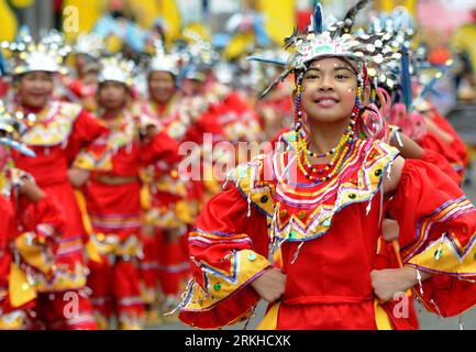 Bildnummer: 55807671  Datum: 20.08.2011  Copyright: imago/Xinhua (110820) -- MANILA, Aug. 20, 2011 (Xinhua) -- Street dancers wearing colorful costumes perform during the celebration of Kadayawan Festival in Davao City, Philippines, Aug. 20, 2011. The festival which includes parades, tribal dances and trade fairs, is held annually in celebration of life, a thanksgiving for the gifts of nature, the wealth of culture, the bounties of harvest and serenity of living. (Xinhua/Stringer) (lt) PHILIPPINES-KADAYAWAN FESTIVAL PUBLICATIONxNOTxINxCHN Gesellschaft Land Leute Tracht Kostüme xdf x0x 2011 que Stock Photo