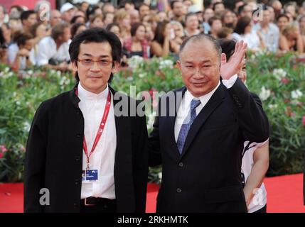 Bildnummer: 55869762  Datum: 31.08.2011  Copyright: imago/Xinhua (110831) -- VENICE, Aug. 31, 2011 (Xinhua) -- Producer John Woo (R) and director Te-Sheng Wei of the film Saideke Balai (Seediq Bale) pose on the red carpet during the opening of the 68th Venice International Film Festival in Venice, Italy, Aug. 31, 2011. (Xinhua/Wang Qingqin) ITALY-VENICE-FILM FESTIVAL-RED CARPET PUBLICATIONxNOTxINxCHN Entertainment Kultur People Film 68 Filmfestspiele Venedig Filmpremiere Premiere premiumd xns x0x 2011 quer     Bildnummer 55869762 Date 31 08 2011 Copyright Imago XINHUA  Venice Aug 31 2011 XINHU Stock Photo