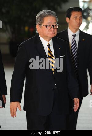 Newly-appointed State Minister in Charge of Financial Service Ikko Nakatsuka enters the Prime Minister's Office in Tokyo, Monday, Oct. 1, 2012. Japanese Prime Minister Yoshihiko Noda reshuffled his Cabinet for the third Newly-appointed State Minister in Charge of Financial Service Ikko Nakatsuka enters the Prime Minister's Office in Tokyo, Monday, Oct. 1, 2012. Japanese Prime Minister Yoshihiko Noda reshuffled his Cabinet for the third