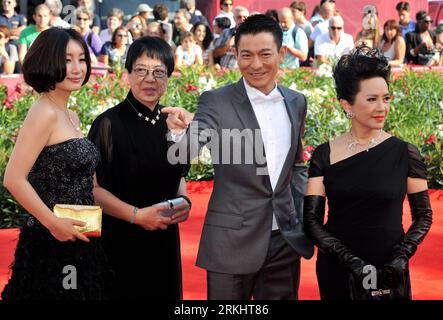Bildnummer: 55896879  Datum: 05.09.2011  Copyright: imago/Xinhua (110906) -- VENICE, Sept. 6, 2011 (Xinhua) -- Director Ann Hui (2nd L), actors Andy Lau (2nd R), Deanie Yip (1st R) and Qin Hailu pose on the red carpet for the premiere of the Chinese Hong Kong film Taojie (A Simple Life) at the 68th Venice International Film Festival in Venice, Italy, Sept. 5, 2011. (Xinhua/Wang Qingqin) (djj) ITALY-VENICE-FILM FESTIVAL-TAOJIE-PREMIERE PUBLICATIONxNOTxINxCHN People Film Kultur 68 Filmfestival Venedig Entertainment Filmpremiere x0x xtm premiumd 2011 quer      55896879 Date 05 09 2011 Copyright I Stock Photo
