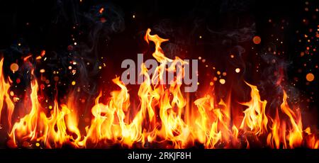 Fire Flames Burning On Black Coal - Barbecue Grill Concept - Abstract Defocused Background Stock Photo