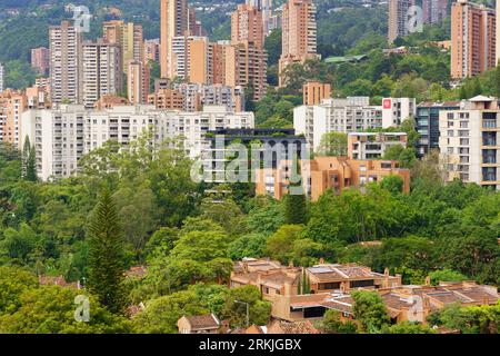 El Poblado neighborhood in Medellin, Antioquia, Colombia. This sector of the city is known for its residential buildings that seem to emerge from the Stock Photo
