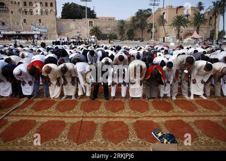 Libyans pray during friday prayers in rebel-held Benghazi, Libya ...