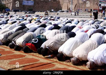 Libyans pray during friday prayers in rebel-held Benghazi, Libya ...