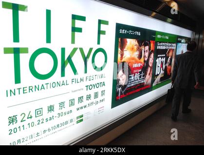 Bildnummer: 56202306  Datum: 21.10.2011  Copyright: imago/Xinhua (111021) -- TOKYO, Oct. 21, 2011 (Xinhua) -- A pedestrian walks past a poster of the Tokyo International Film Festival in Tokyo, Japan, Oct. 21, 2011. The nine-day, 24th Tokyo International Film Festival is scheduled to open on Oct. 22. (Xinhua/Kenichiro Seki) JAPAN-TOKYO-FILM FESTIVAL PUBLICATIONxNOTxINxCHN Kultur Entertainment Film Filmfest Werbung Vorbereitung premiumd xbs x0x 2011 quer      56202306 Date 21 10 2011 Copyright Imago XINHUA  Tokyo OCT 21 2011 XINHUA a Pedestrian Walks Past a Poster of The Tokyo International Fil Stock Photo