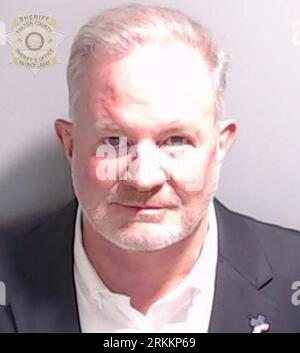 Undated handout photo issued by Fulton County Sheriff's Office of the booking photo of Scott Hall after he surrendered and was booked at the Fulton County Jail in Atlanta. Former US President Donald Trump and 17 others, who are accused by Fulton County District Attorney Fani Willis of scheming to subvert the will of Georgia voters to keep the Republican president in the White House after he lost to Democrat Joe Biden. Issue date: Friday August 25, 2023. Stock Photo